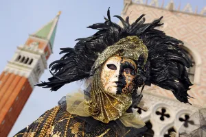 People wearing masks and costumes at the Venice Carnival
