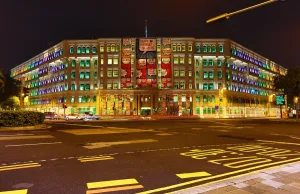 Night: Rainbow coloured lights in the windows of the Old Hill Street Police Station housing the Ministry of Communications