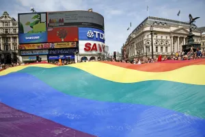 Mardi Gras March: Rainbow Flag at Piccadilly Circus at London Pride Parade 2009