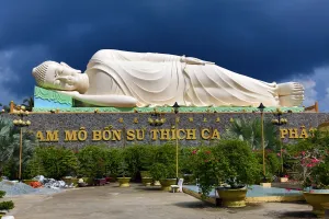 Vietnam: Reclining Buddha statue at Vinh Trang Temple, near My Tho, Mekong Delta, Vietnam