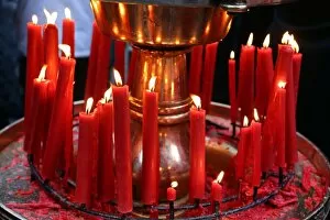 Red candles burning at the Longshan Buddhist Temple at Chinese New Year in Taipei, Taiwan