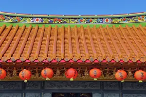 : Red lanterns and roof decorations on the Shengming Taoist Temple in Jiufen, Taiwan ROC