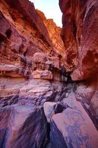 Amman And Jordan: Red rock formations of Khazali Canyon in the desert at Wadi Rum, Jordan