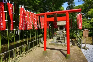 Tokyo, Japan: Red Torii Gate at Hase-dera Buddhist Temple in Kamakura near Tokyo, Japan