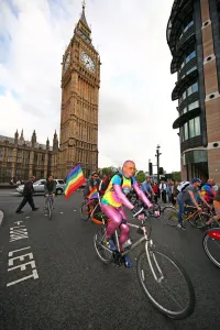 Flags: Ride with Pride bicycle ride for London Pride passes Big Ben