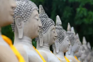 Row of Buddha statues at Wat Yai Chaimongkol Temple, Ayutthaya, Thailand