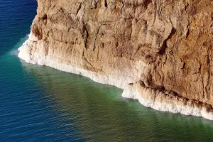 Amman And Jordan: Salt deposits on the rocky shoreline of the Dead Sea, Jordan