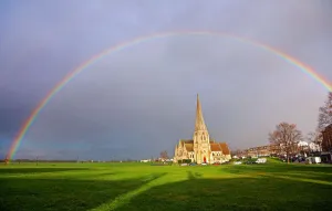 Churches: Seasonal weather - Rainbow over All Saints Church, Blackheath, London, UK