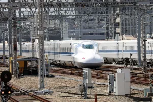 High: Shinkansen high speed train at Shin-Osaka station, Osaka, Japan