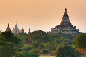 Archaeology: Shwesandaw Pagoda and Temples and pagodas at sunset on the Central Plain of Bagan