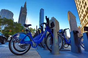 States: Skyscraper buildings around Madison Square and Citibike bicycle hire bicycles