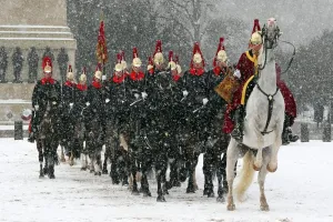 Snow spooks horse at the Changing of the Queens Life Guards, London