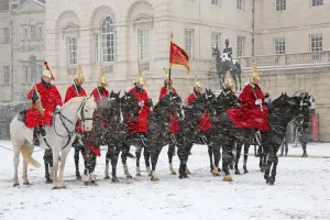 Snow spooks horse at the Changing of the Queens Life Guards, London