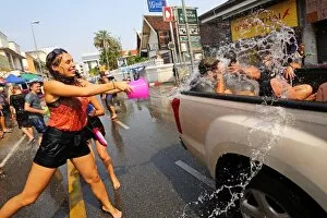 Songkran, the Thai New Year festival kicks off with a huge water fight in Chiang Mai, Thailand