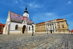 Symbols: St. Marks Church and the Croatian Parliament in St. Marks Square in Zagreb, Croatia