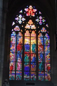 Stock Geography: Stained glass window in St. Vitus Cathedral in Prague