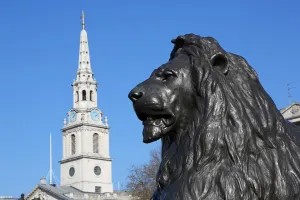 Nelsons: Statue of lion beneath Nelsons Column in Trafalgar Square, London, England