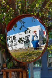Editor's Picks: Statue at the Pier 2 Art Center in a mirror, Kaohsiung City, Taiwan
