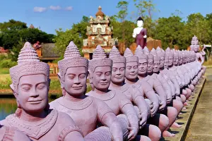 Statues: Statues forming a bridge at Muang Boran