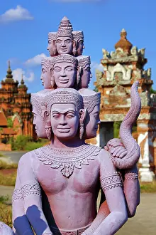 Statues: Statues forming a bridge at Muang Boran