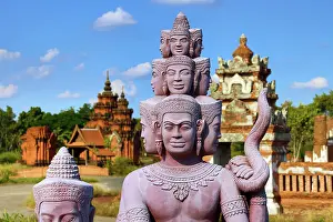 Statues: Statues forming a bridge at Muang Boran