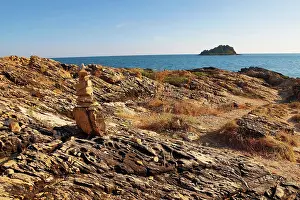 Column: Stone cairn at Ao Pakarang viewpoint at the tip of Koh Samet island, Thailand