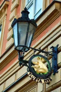 Lamp: Street lamp and golden mouse sign for the Tlusta Mys (Fat Mouse), Prague, Czech Republic