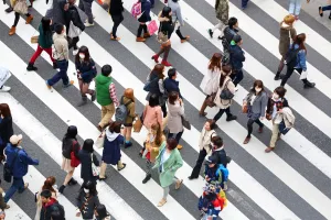 Road: Street scene of people on a zebra crossing in Harajuku, Tokyo, Japan