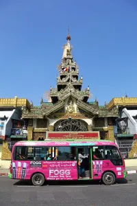 Rangoon: Street scene with traffic and the Sule Pagoda, Yangon, Myanmar