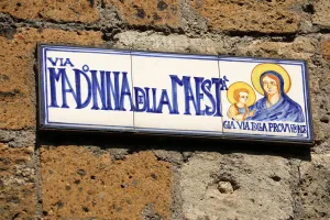 Plateau: Street sign for the Via Madonna della Maesta in the hilltop village of Civita di Bagnoregio