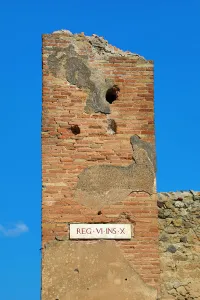 Ancient: Street sign Rex VI ins X in the ancient Roman city of Pompeii, Italy