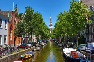 Amsterdam: Tower of the Zuiderkerk, southern church, and the Groenburgwal canal in Amsterdam
