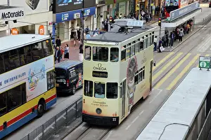 Prints of Traditional Hong Kong electric tram in Causeway Bay, Hong Kong, China Hong Kong Images: Traditional Hong Kong electric tram in Causeway Bay, Hong Kong, China
