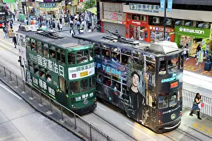 Prints of Traditional Hong Kong electric trams in Causeway Bay, Hong Kong, China Hong Kong Images: Traditional Hong Kong electric tram in Causeway Bay, Hong Kong, China
