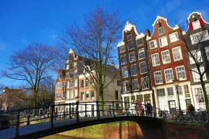 Netherlands: Traditional houses and a bridge over a canal on Brouwersgracht in Amsterdam, Holland
