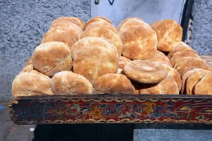 Stall: Traditional Moroccan flat bread on sale in the street in the Medina of Rabat, Morocco