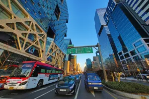 Modern: Traffic, tall modern buildings and office blocks at dusk in the Gangnam district