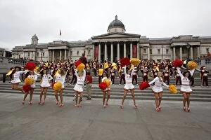USC Marching Trojans band and cheerleaders performing in Trafalgar Square, London, England