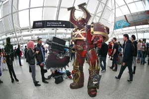 MCM London Comic Con: A Warhammer Chaos Space Marine dwarfs participants at MCM London Comic Con at Excel