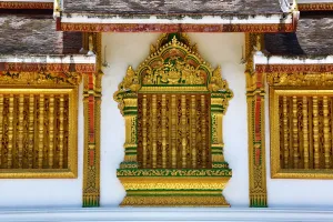 Luang Prabang, Laos: Window decorations at Wat Ho Prabang Temple, Luang Prabang, Laos