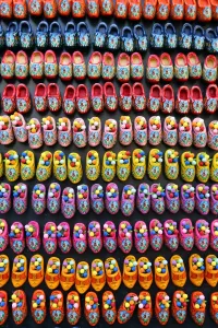 Souvenir: Wooden clogs fridge magnets on sale in the flower market in Amsterdam, Holland